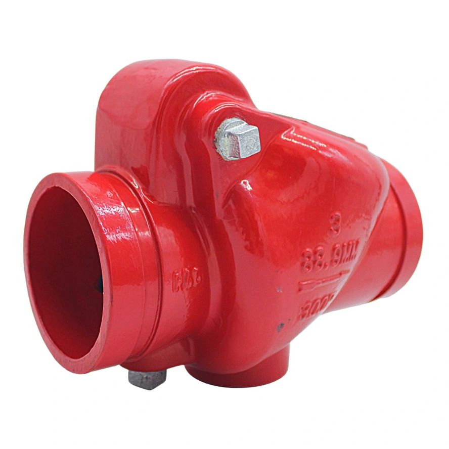 The Swing Check Valve (Grooved) is a red valve with metallic finish, featuring two openings and hexagonal bolts, suitable for plumbing or machinery systems.