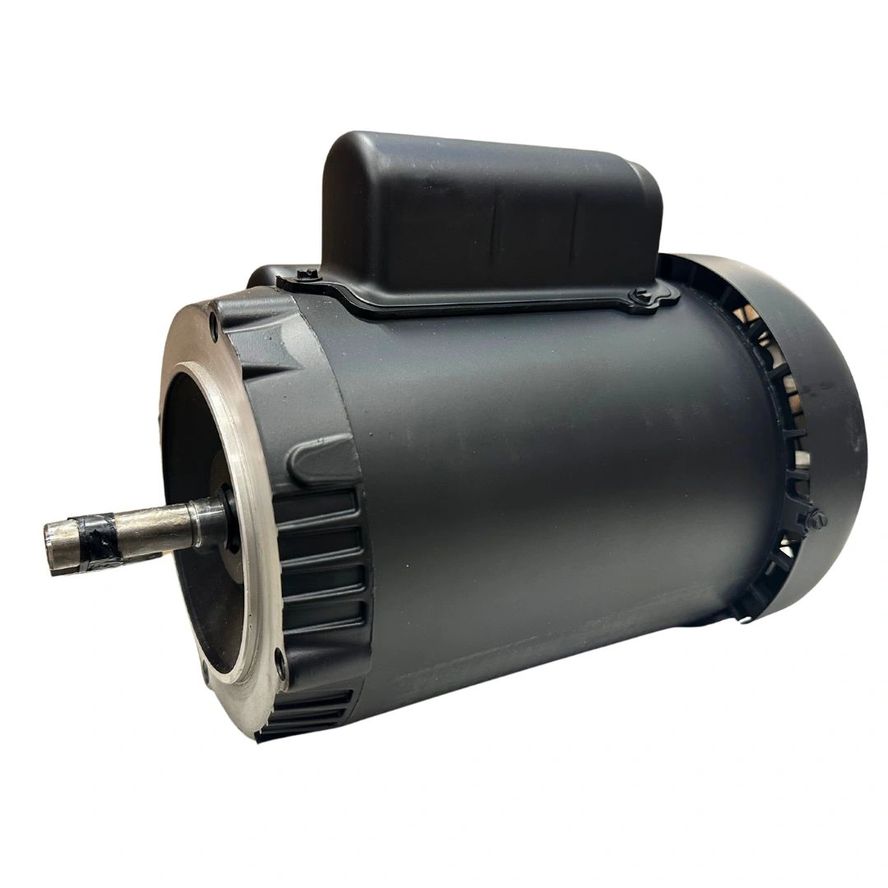 A large one-phase electric motor with a cylindrical black body, visible rotor shaft, and cooling fins is positioned on a white background.