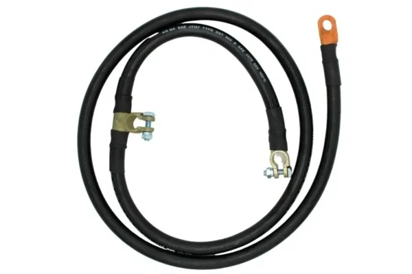 A black hose with an orange end and a copper wire.